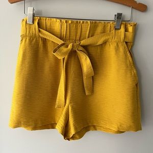 Hem & Thread Mustard Yellow Flowy Paper Bag Shorts, Size Medium